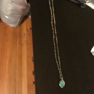 Long gold and aqua design necklace
